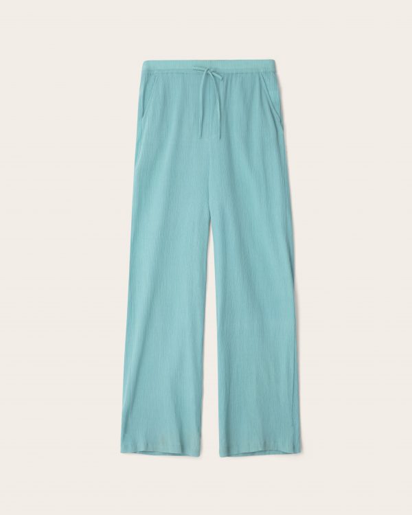 Turquoise trousers in cotton crepe handmade in Morocco and India. Genderless bougroug style. Designed by Anwar Bougroug